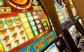 Filipino player using okay game on a smartphone to place a sports bet