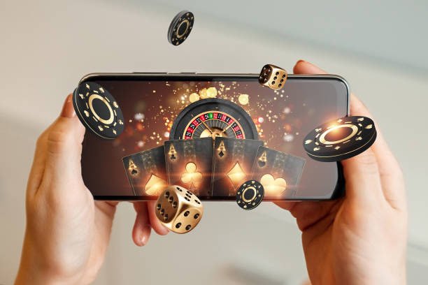 Filipino player reviewing recent wins on okay game using a smartphone